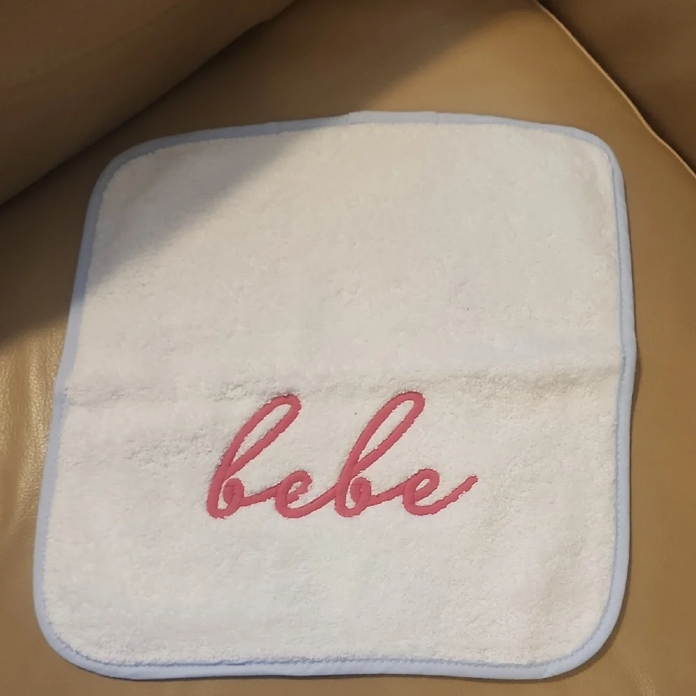 Bebe White Wash Cloth Monogram Pink Logo and Light Blue Trim 100% Cotton NWOT.